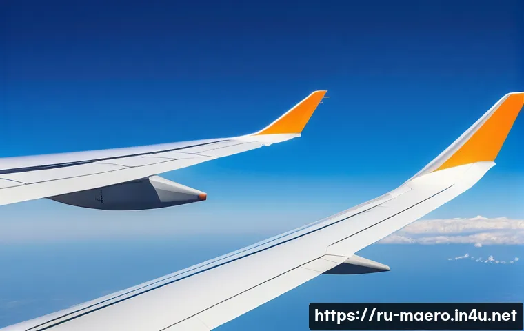 항공기 공기역학 - A detailed close-up of an advanced aircraft wing in flight, showcasing the aerodynamic design with a...